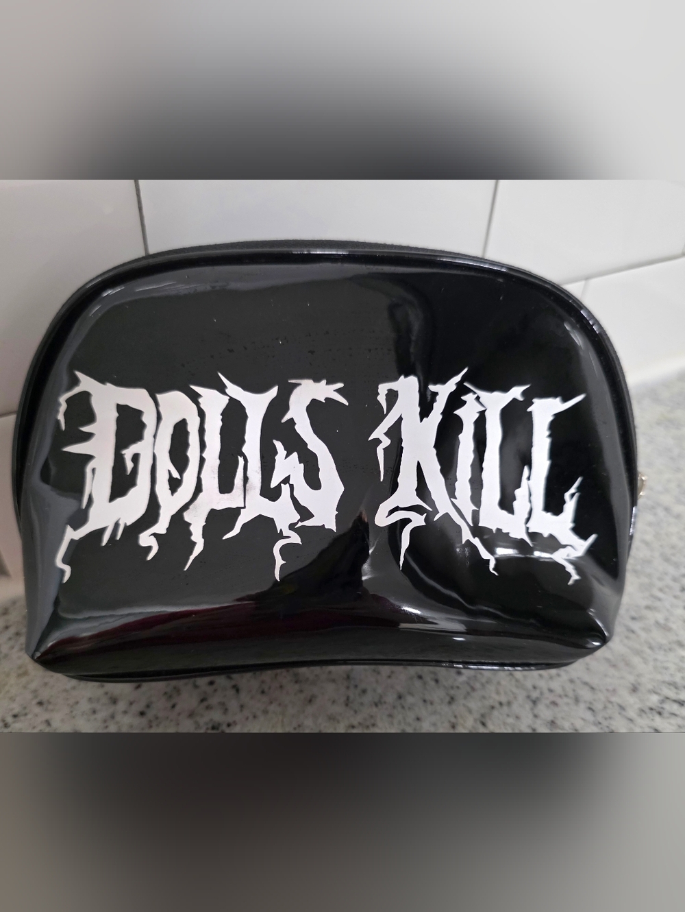 Dolls Kill Glossy Makeup Bag with White Graphic Text